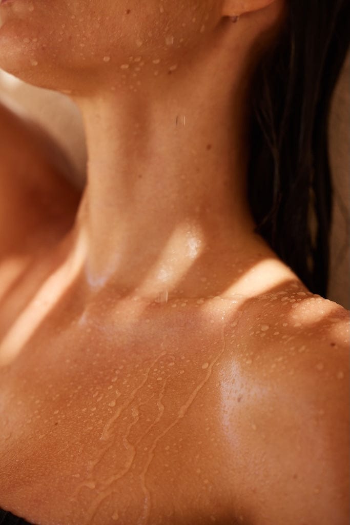 Close-up of skin in shower